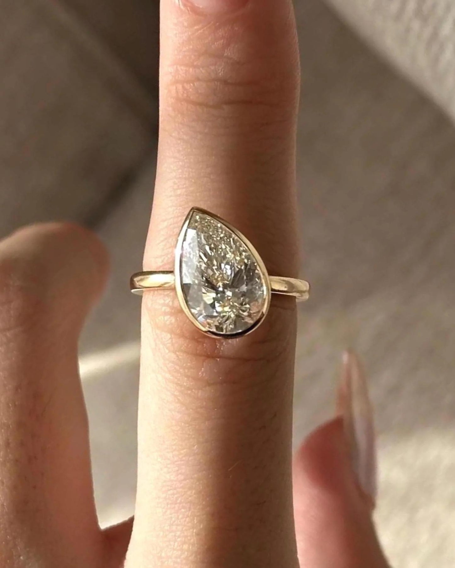 Pear bezel diamond pinky ring 1CT