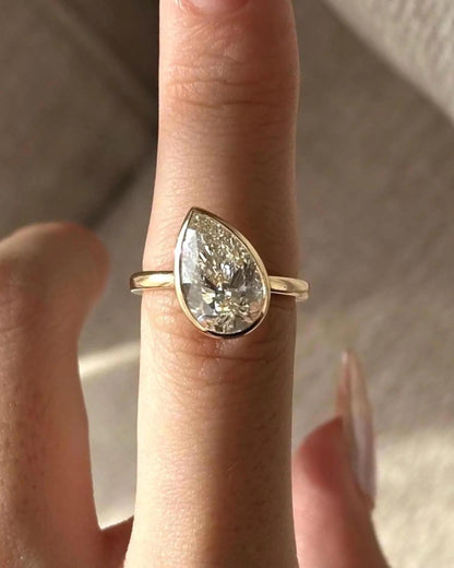 Pear bezel diamond pinky ring 1CT