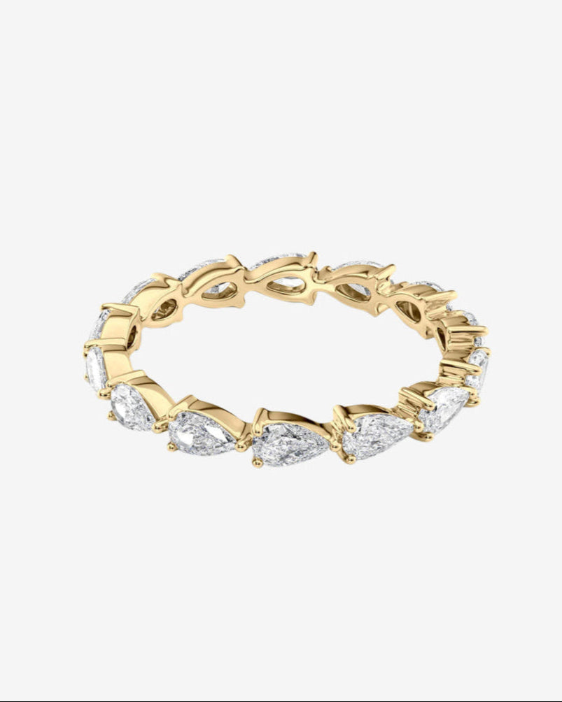 Pear east west eternity ring