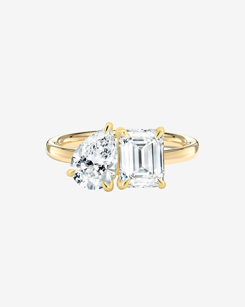 The Toi et Moi Emerald and Pear Engagement Ring