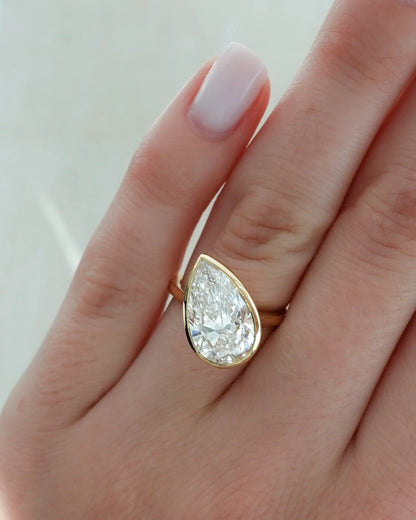 Pear bezel diamond pinky ring 1CT